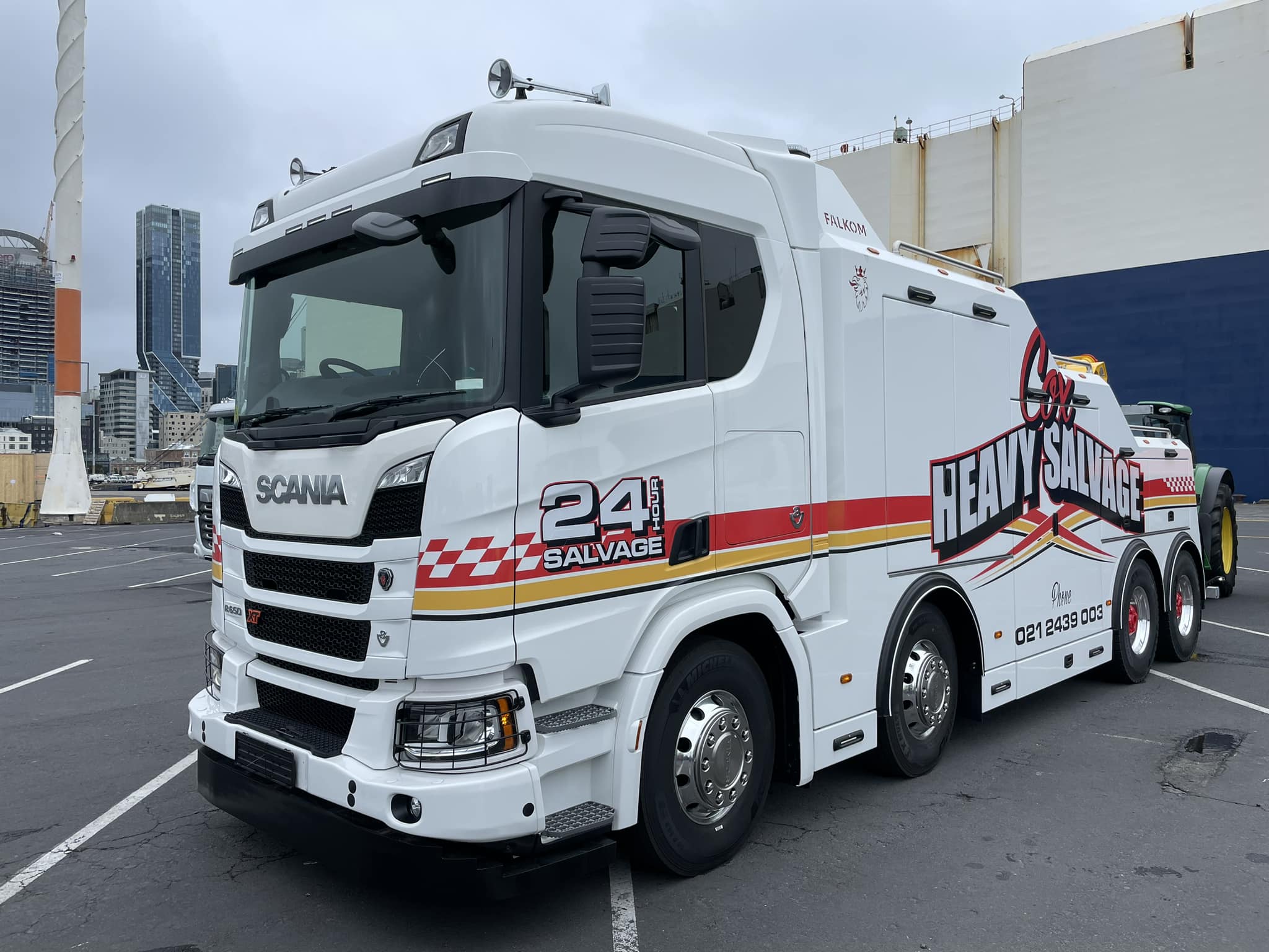 Landscape trucks lined up at a port